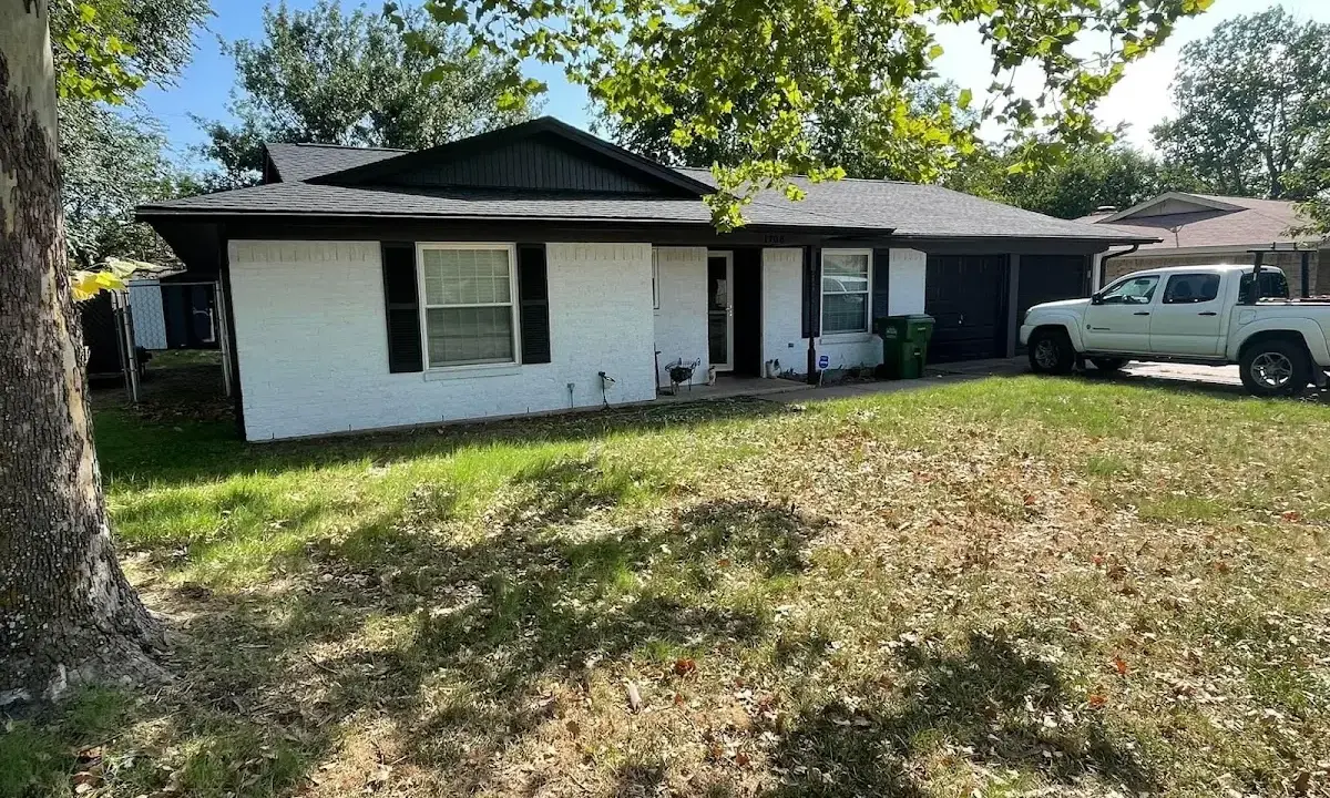 Professional roofing crew working on a residential roof in Hartsville-Trousdale County